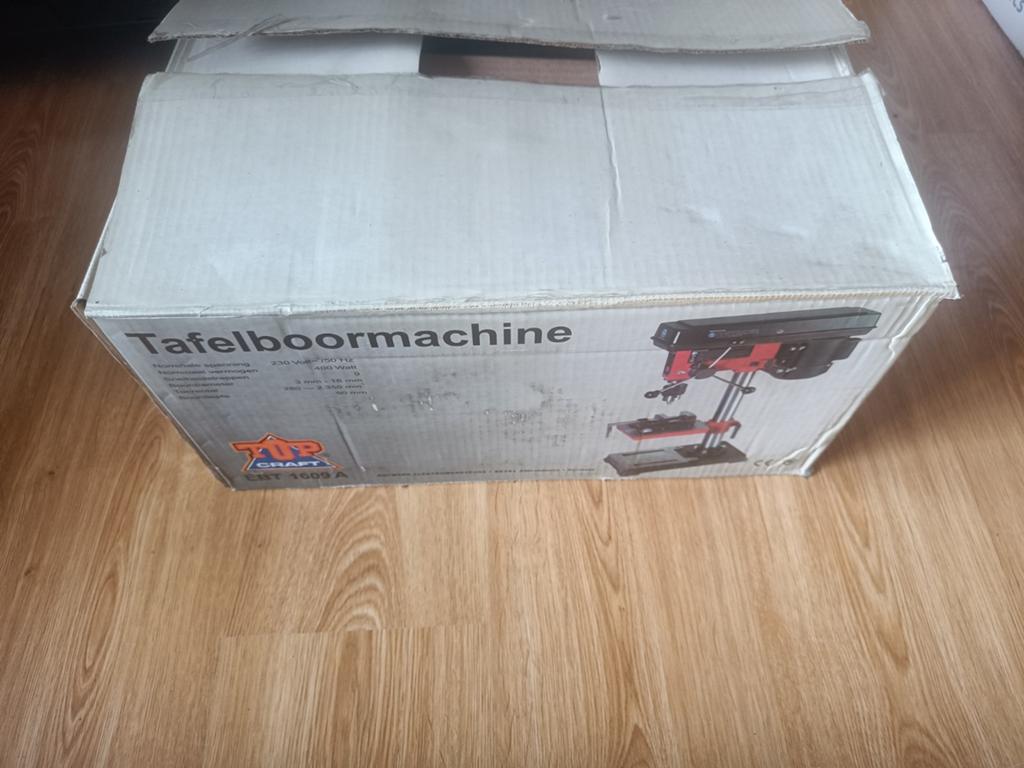 Tafel boormachine, Ophalen