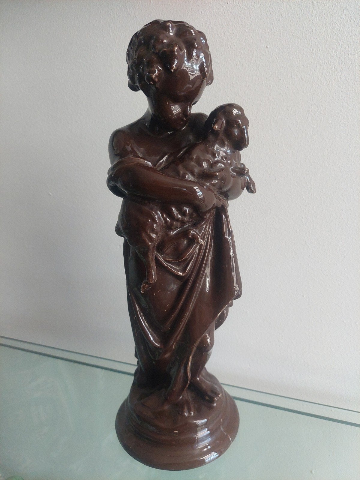 Beeld Putti met lam, Ophalen