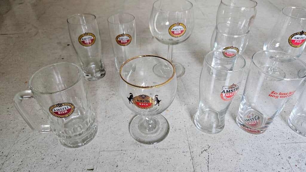 30 Verschillende Amstel glazen, Verzamelen, Ophalen of Verzenden, Zo goed als nieuw, Bierglas