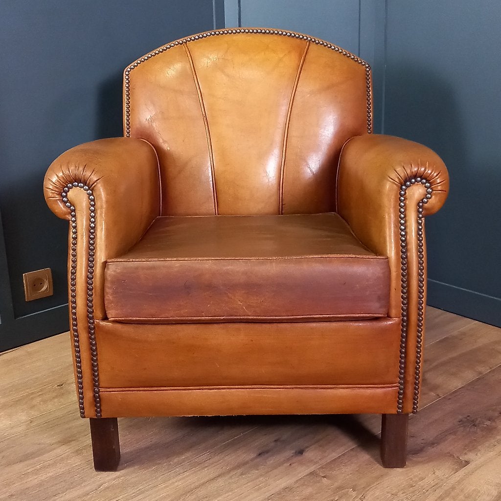 Karaktervolle Schapenleren Fauteuil (1 van 2), Huis en Inrichting, Fauteuils, Gebruikt, Ophalen of Verzenden, 50 tot 75 cm, Leer