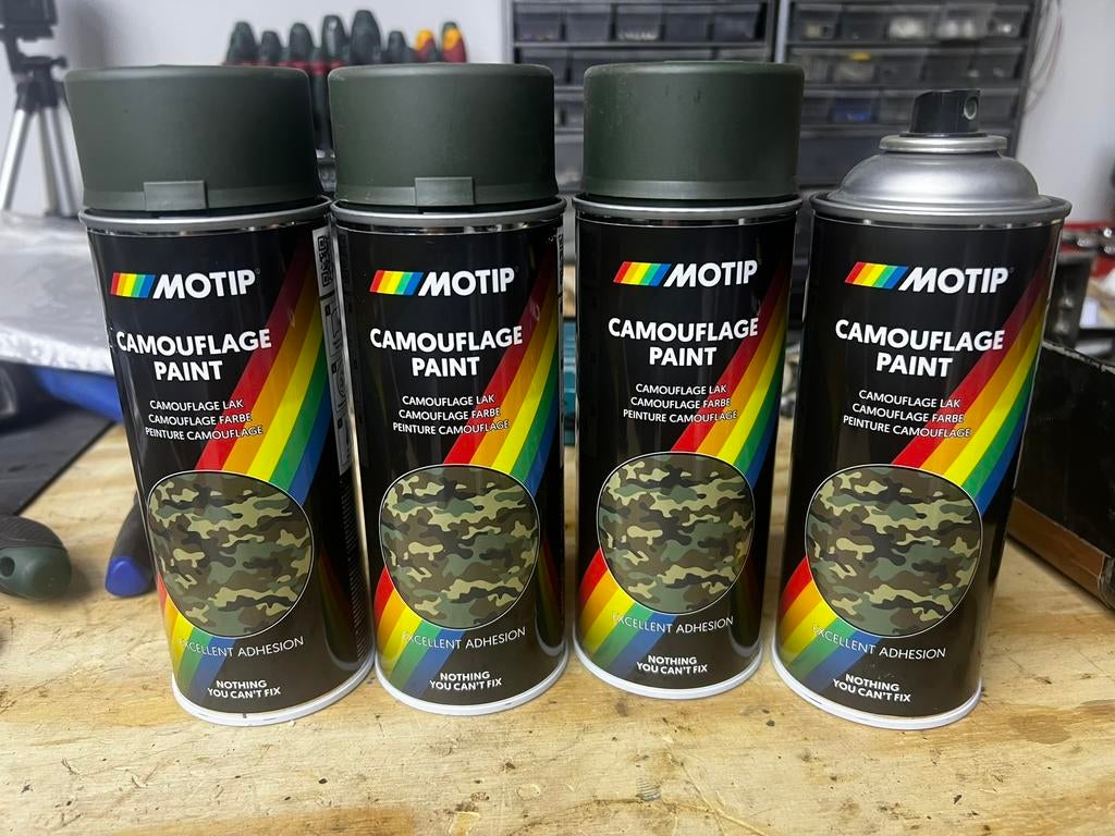 Camouflage spuitbussen motip, Ophalen