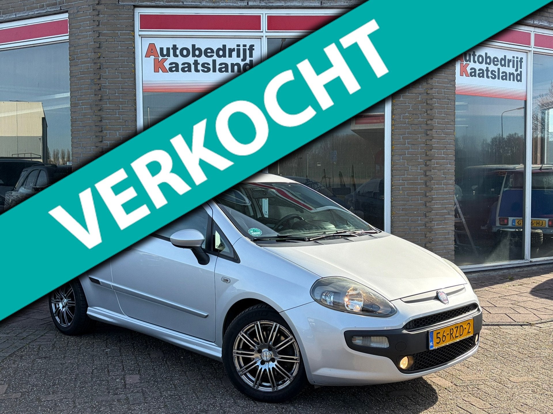 Fiat Punto Evo 1.3 M-Jet Racing - Leder - Clima - Cruise - Z, Auto's, Voorwielaandrijving, Euro 5, Gebruikt, Zwart