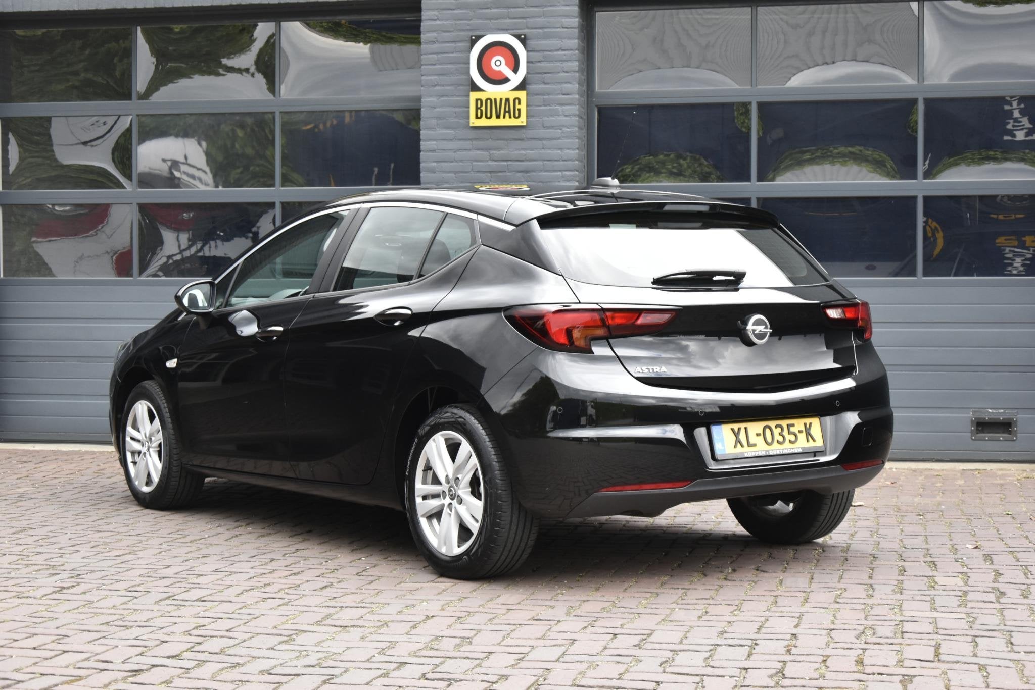Opel Astra 1.4 Turbo Business Automaat, Auto's, Opel, 12 maanden, Stof, Gebruikt, 620 kg
