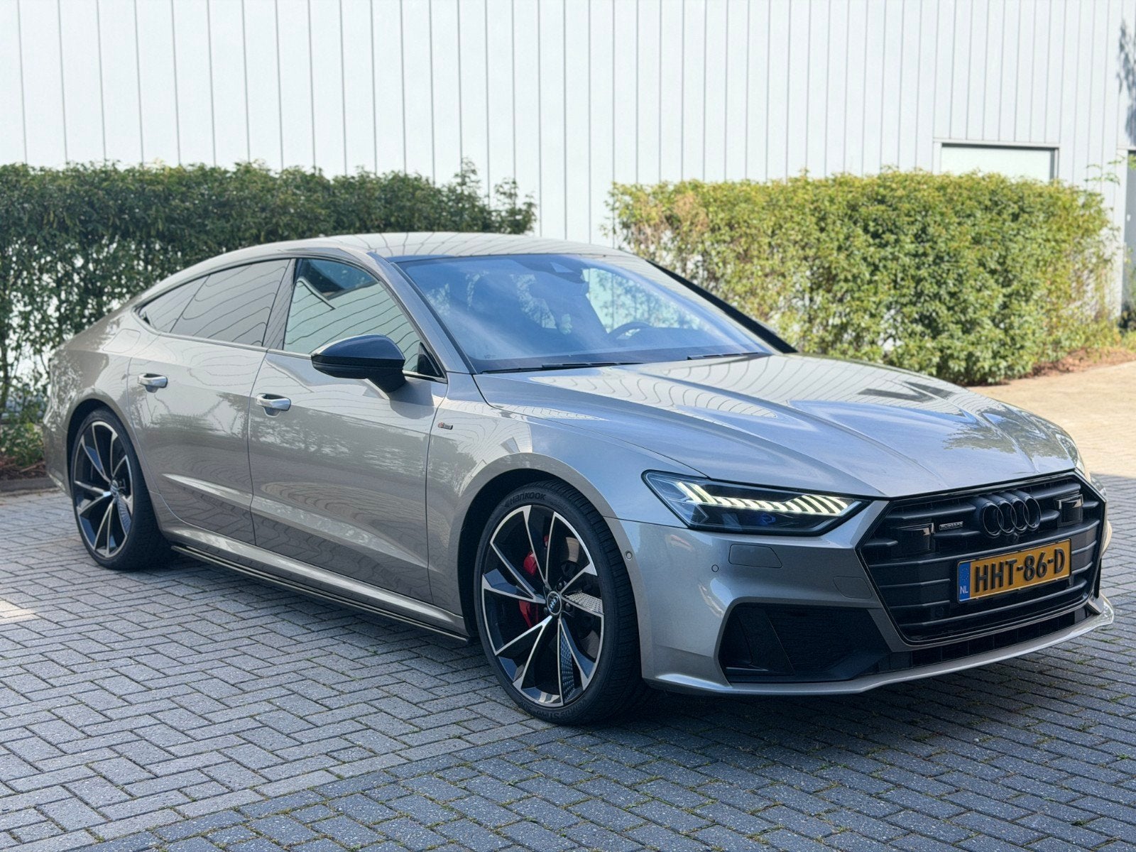 Audi A7 55 Tfsi e Quattro 367pk S Tronic 2020 Geel, Auto's, Audi, 4 stoelen, Vierwielaandrijving, Geïmporteerd, Te koop