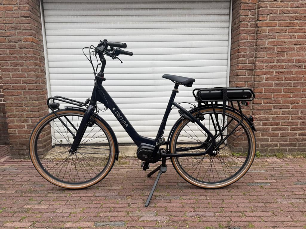 Hele nette Cortina E-Common middenmotor, Ophalen, Zo goed als nieuw, Cortina, 50 km per accu of meer