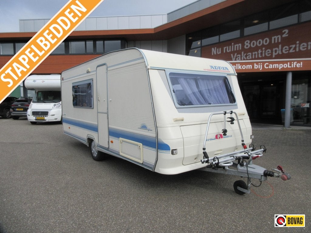 Adria Unica B 502 UK 5 PEROONS MET STAPELBED, Caravans en Kamperen, Reservewiel, Dwars-stapelbed, Treinzit, Adria