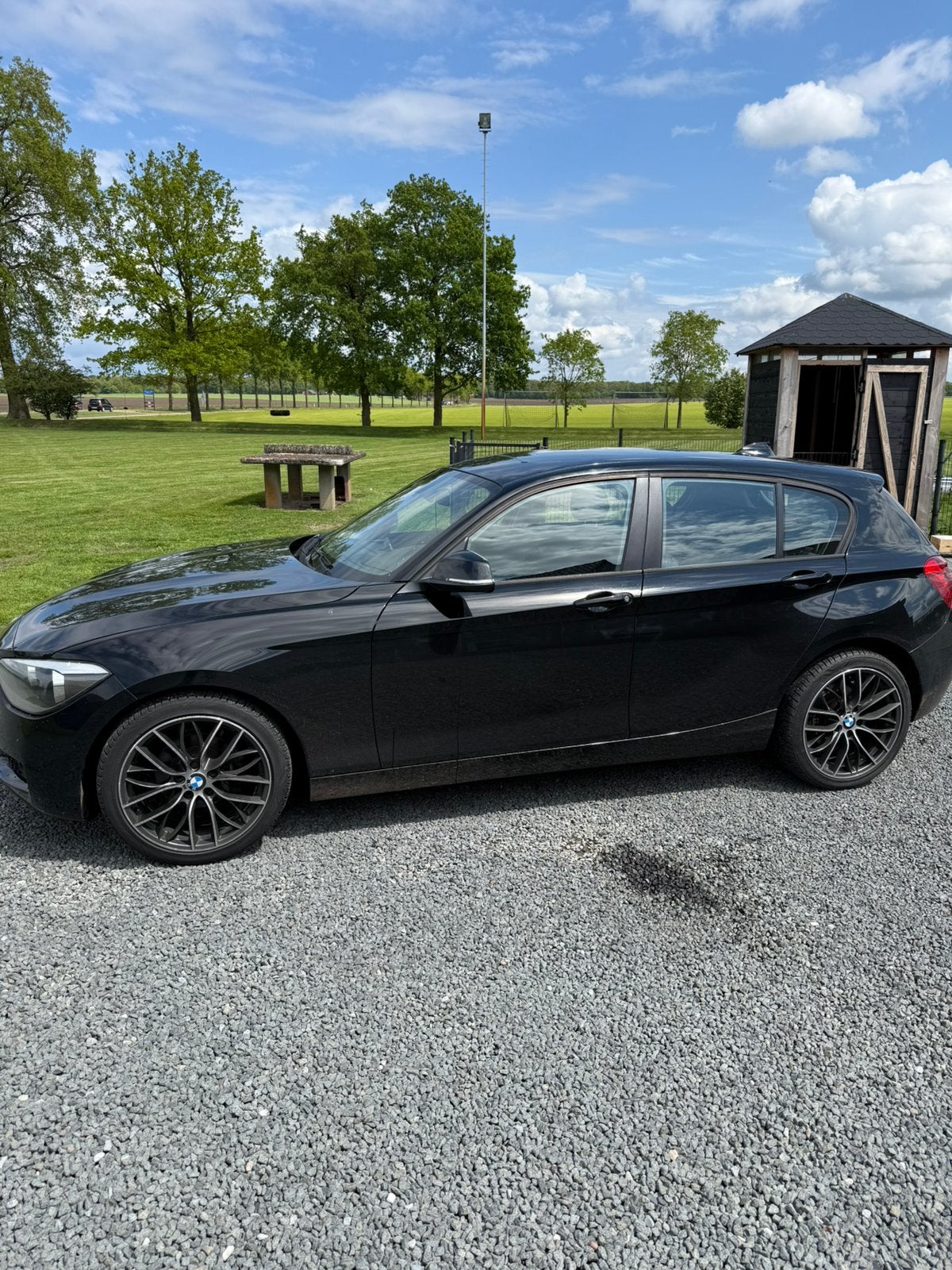 BMW 1-Serie 116I 100KW 5DR 2012 Zwart, Auto's, BMW, 1-Serie, Zwart, 4 cilinders, Zwart