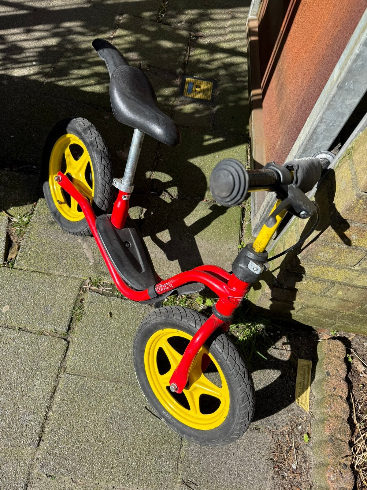 Puky loopfiets rood geel, luchtbanden, Ophalen, Gebruikt, Loopfiets