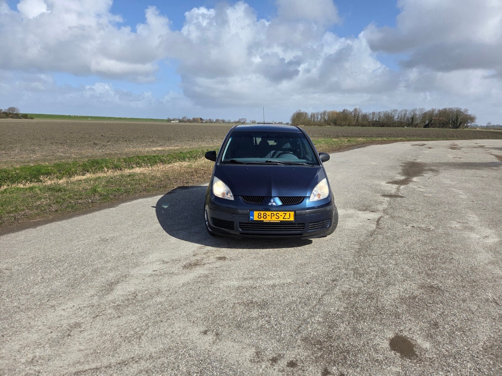 Mitsubishi Colt 1.3 CZ5 2004 Blauw Airco, Auto's, Stof, 31 €/maand, Blauw, Colt
