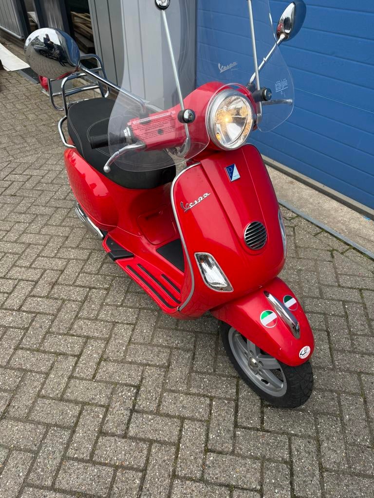 Lx vespa mooie rode 2013, Ophalen of Verzenden, Zo goed als nieuw, Overige typen, Vespa