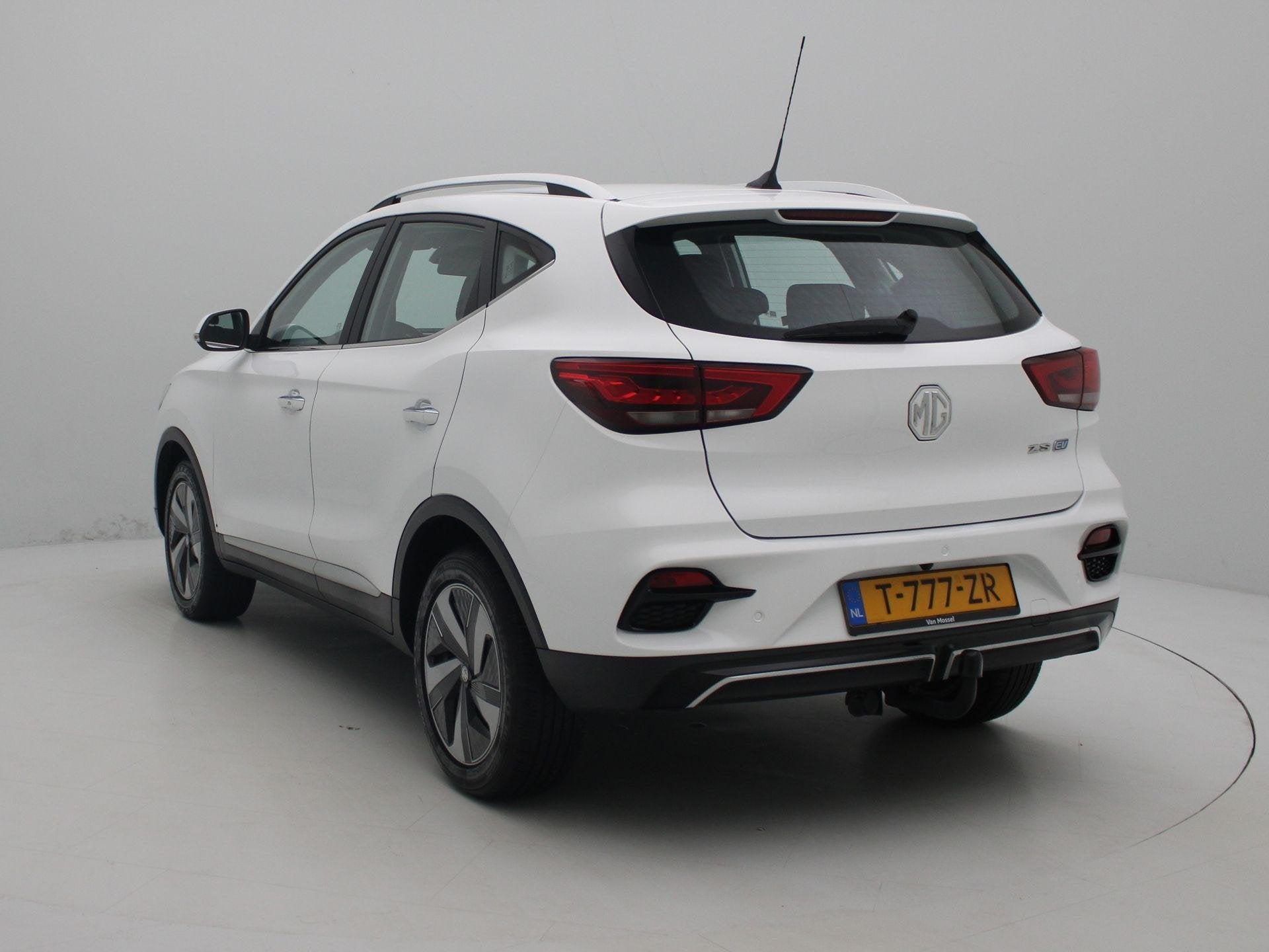 MG ZS EV Long Range Comfort 70 kWh, Auto's, 12 maanden, Stof, ZS, Wit