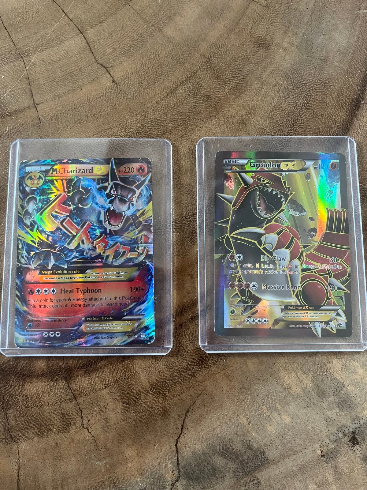 Pokémon kaarten: Mega Charizard EX & Groudon EX, Ophalen of Verzenden, Zo goed als nieuw, Meerdere kaarten, Foil