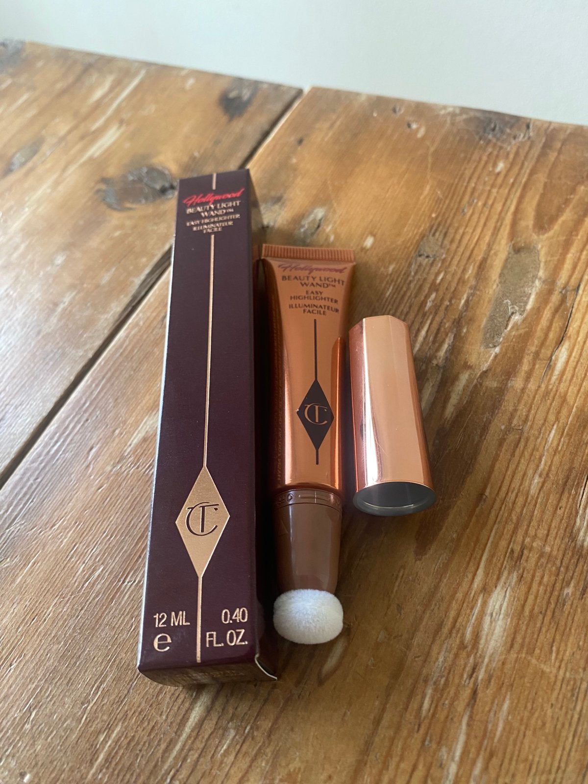 Charlotte Tilbury liquid highlighter, Nieuw, Make-up, Goud, Verzenden