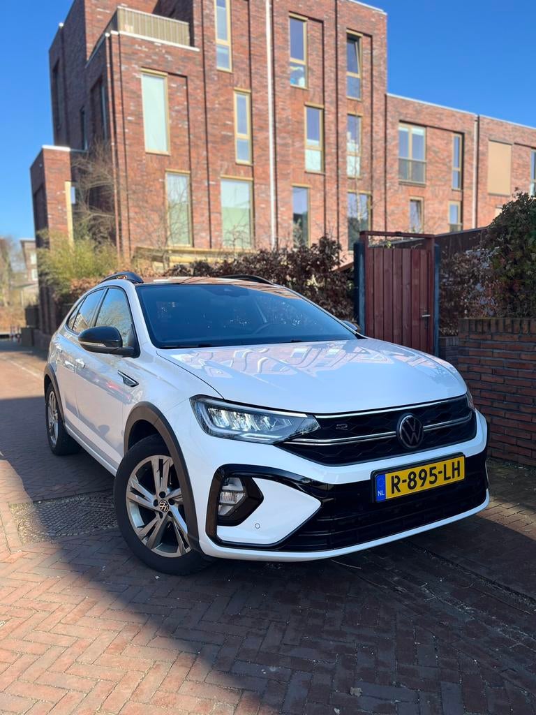 Volkswagen Taigo 1.0 TSI 110pk 2022 Wit, Auto's, 49 €/maand, Origineel Nederlands, 5 stoelen, 110 pk