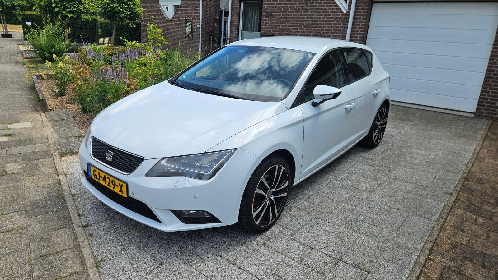 Seat Leon 1.2 TSI 77KW/105PK 2013 Wit, Voorwielaandrijving, 4 cilinders, Leon, Handgeschakeld