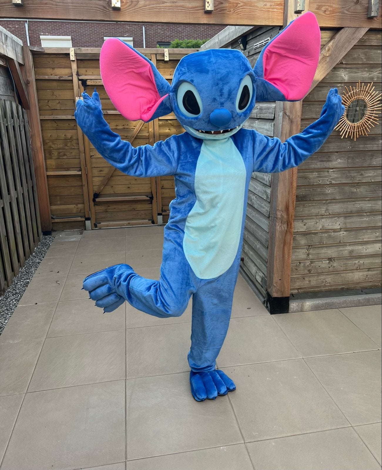 Te huur: Stitch Mascotte Pak - Perfect voor Feestjes!, Ophalen, Nieuw, Pak of Jurk