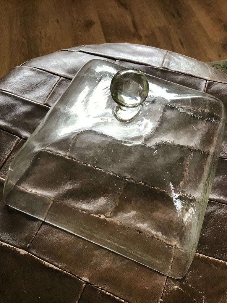 vierkantige glazen stolp, Ophalen