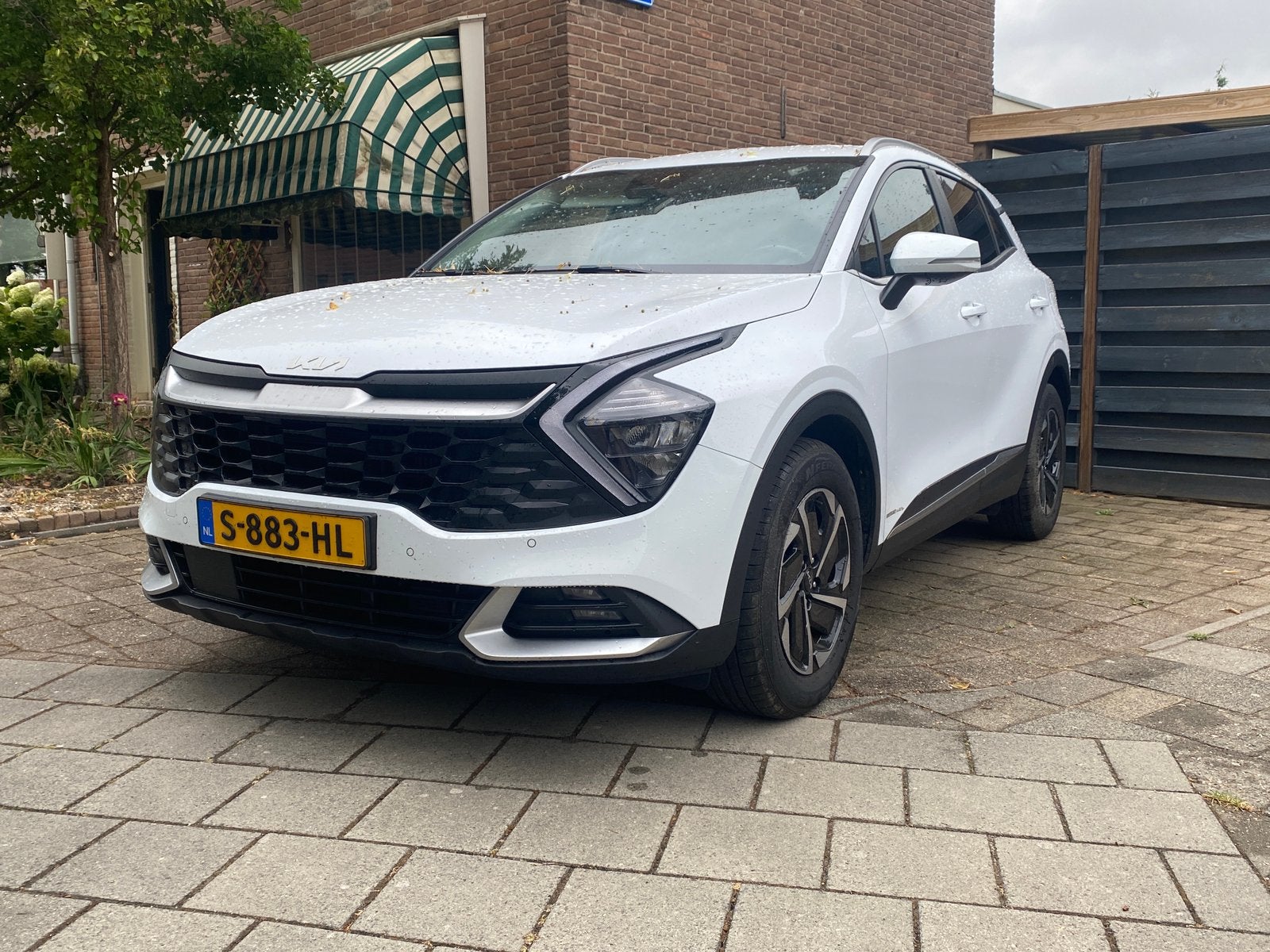 Kia Sportage 1.6 T-gdi Hybrid 2023, Auto's, Kia, 4 cilinders, 179 pk, 1650 kg, Wit