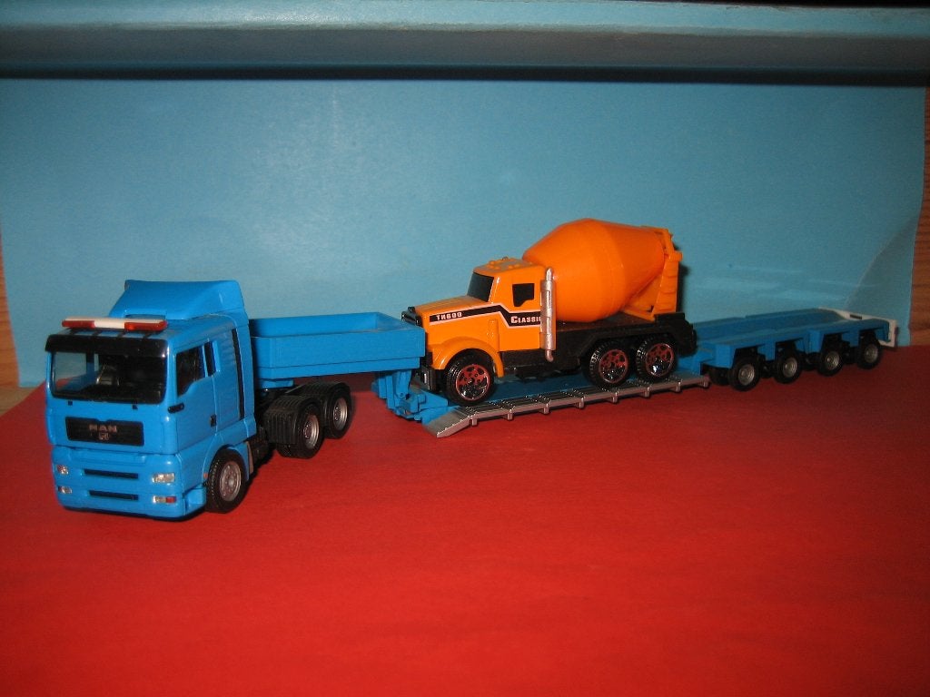 Blanco Zwaar-transport MAN met dieplader + lading Herpa, Ophalen of Verzenden, Zo goed als nieuw, Bus of Vrachtwagen, Herpa