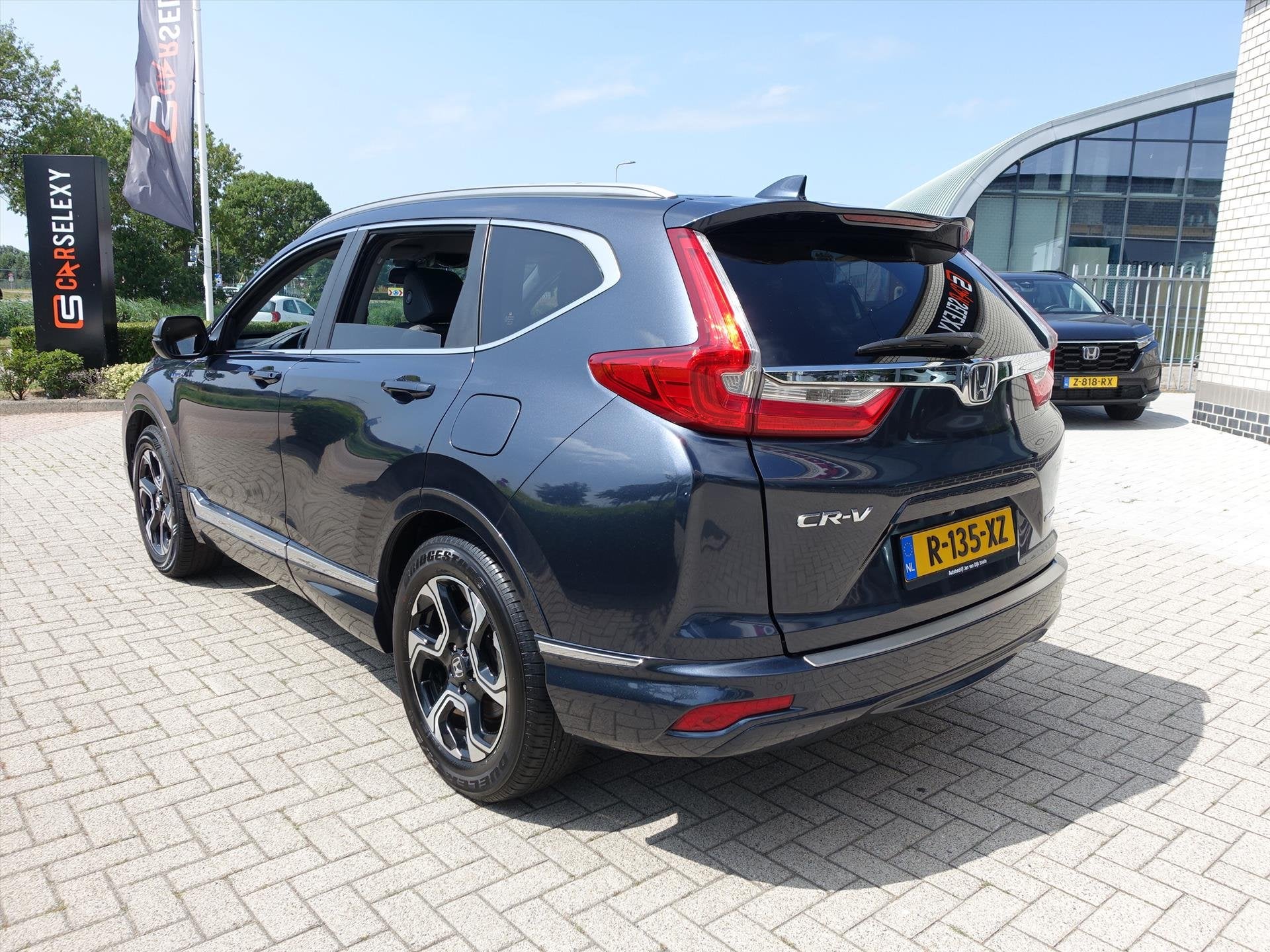 HONDA CR-V 2.0 Hybride 184pk 2WD E-CVT Lifestyle, Auto's, Automaat, Gebruikt, Blauw, Leder