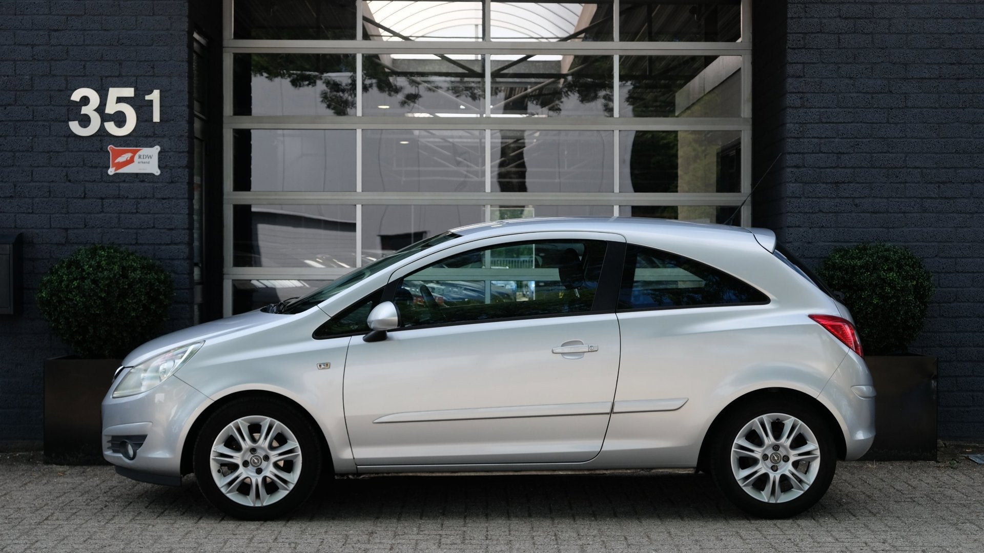 Opel Corsa 1.4-16V Enjoy, Auto's, Opel, Voorwielaandrijving, Stof, Gebruikt, Zwart