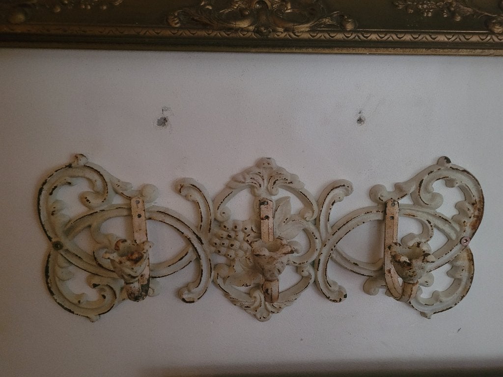 Oude gietijzeren wandkandelaar, Antiek en Kunst, Curiosa en Brocante, Ophalen of Verzenden
