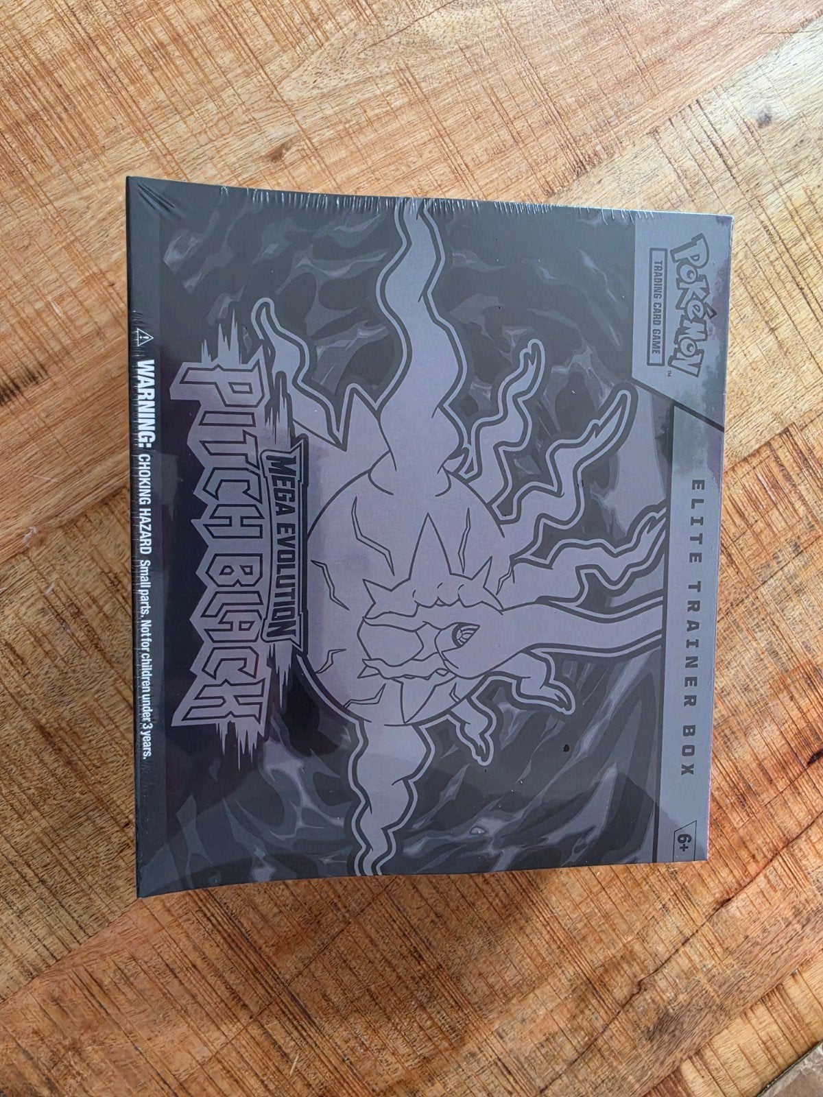 Pokémon Mega Evolution Pitch Black Elite Trainer Box, Ophalen of Verzenden, Nieuw, Foil