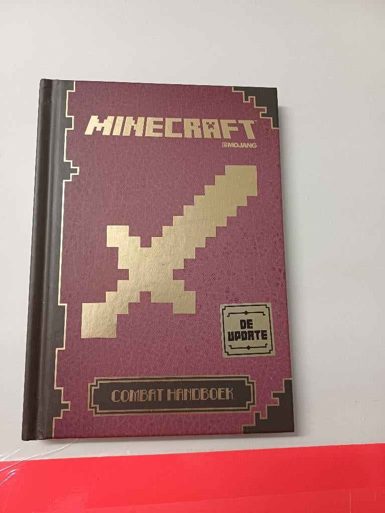 Boek - Mojang - Minecraft - Combat Handboek De Update, Ophalen of Verzenden, Gelezen