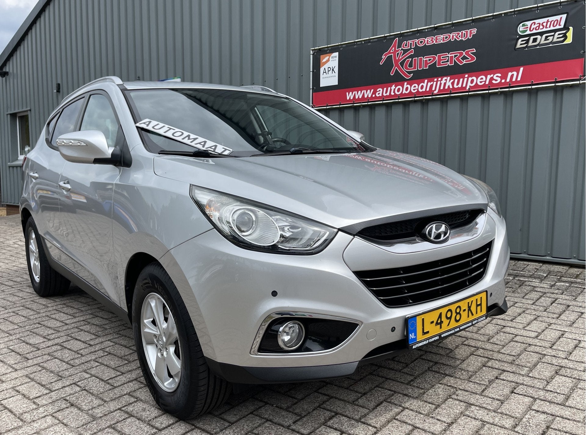 Hyundai ix35 2.0i Style Automaat Clima.Cruise.Pdc.Lm.velgenA, Gebruikt, Zwart, 4 cilinders, Automatische klimaatregeling