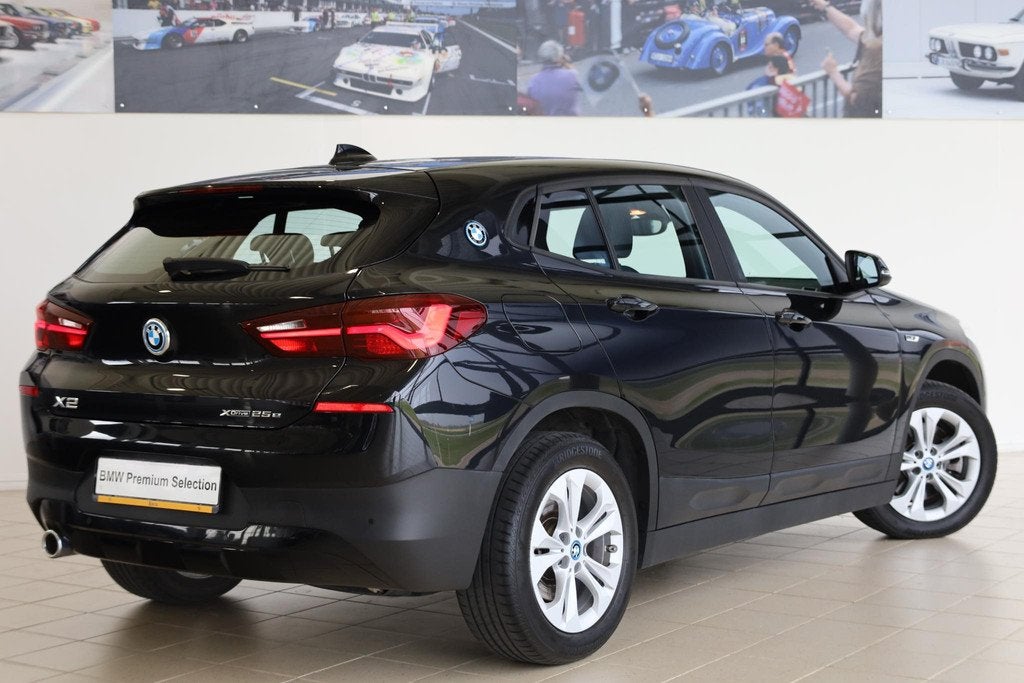 BMW X2 xDrive25e Leder 'Dakota' Schwarz | Navigatiesysteem |, Auto's, BMW, Automaat, X2, Gebruikt, Met garantie (alle)
