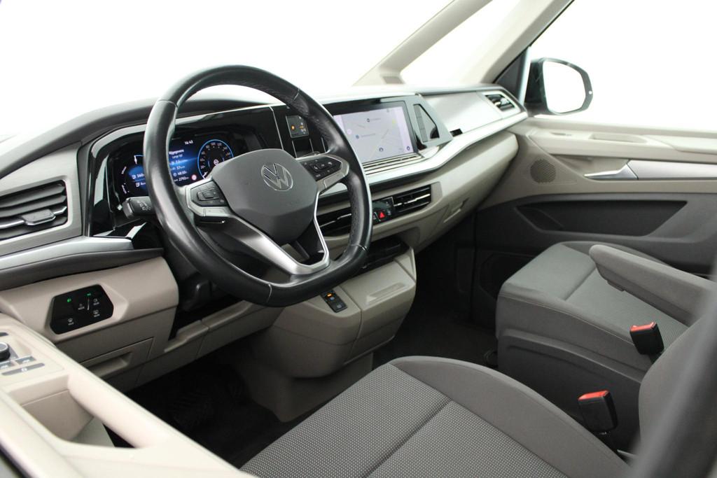 Volkswagen Multivan 1.4 218pk eHybrid L1H1 7-persoons Naviga, Stof, Gebruikt, 7 stoelen, Hybride Elektrisch/Benzine