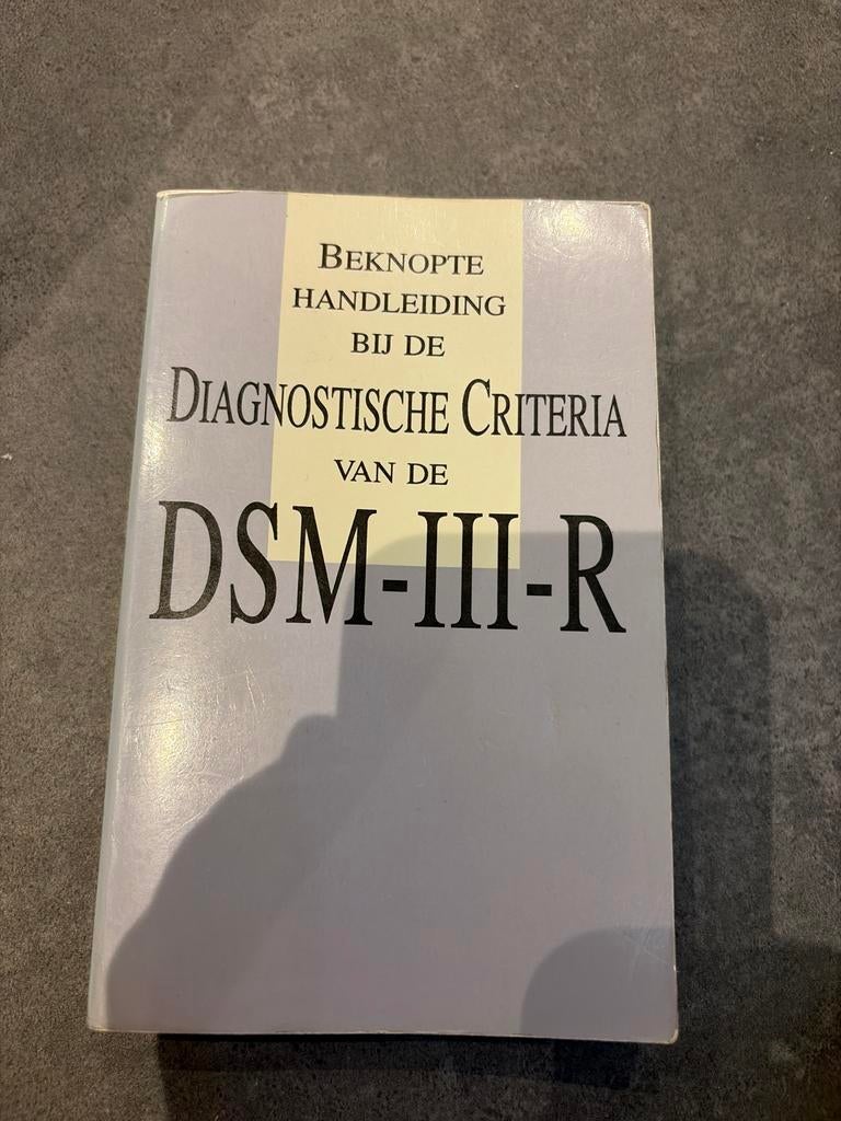 Beknopte Handleiding bij de Diagnostische Criteria DSM-III-R, Ophalen of Verzenden, Zo goed als nieuw