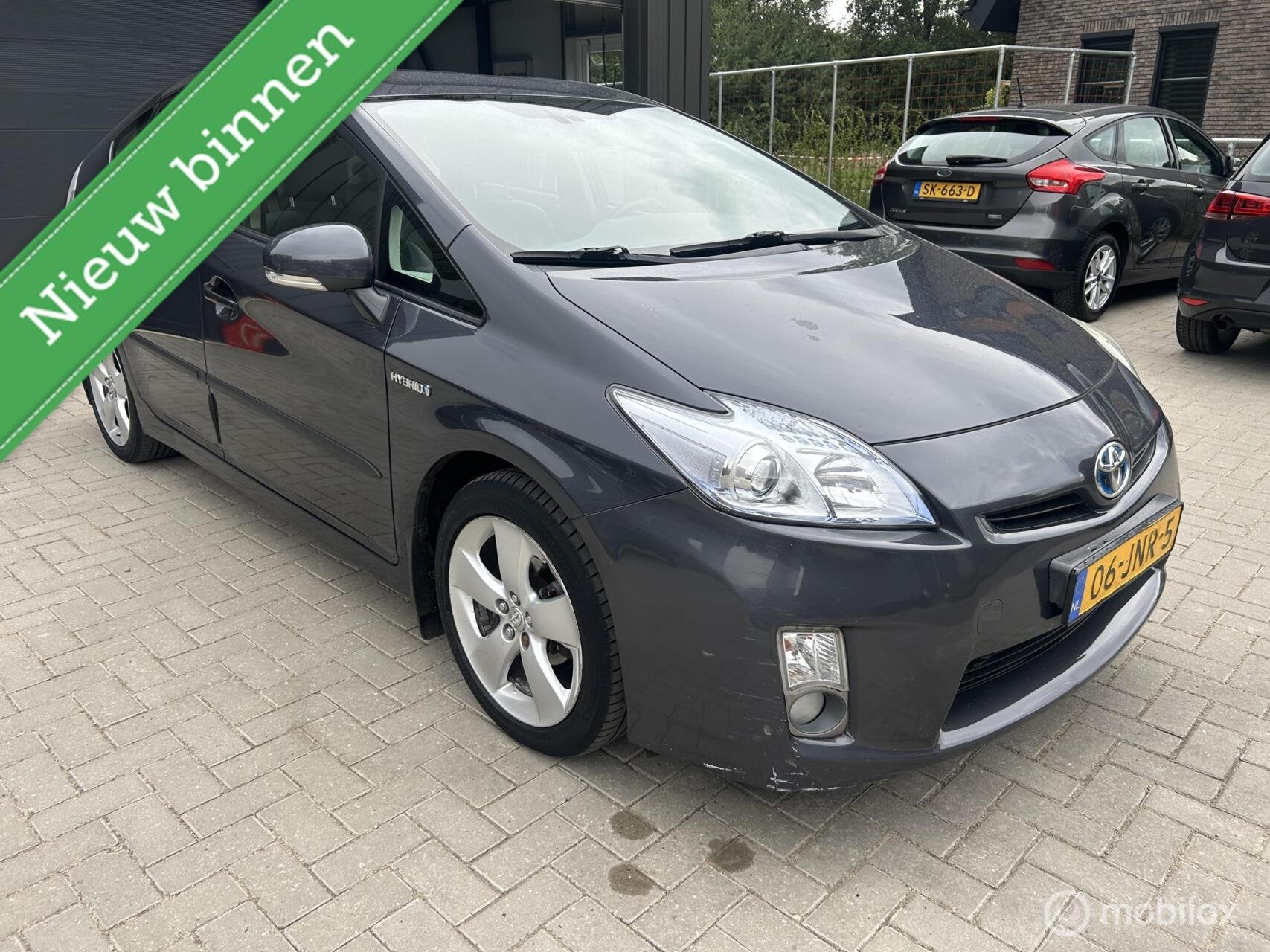 Toyota Prius 1.8 Aspiration HUD Navi Keyless, Auto's, Toyota, 136 pk, Gebruikt, 4 cilinders, Automatische klimaatregeling