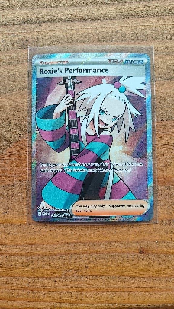 Roxie's Performance 112/086 Chaos Rising Ultra Rare, Ophalen of Verzenden, Nieuw, Losse kaart