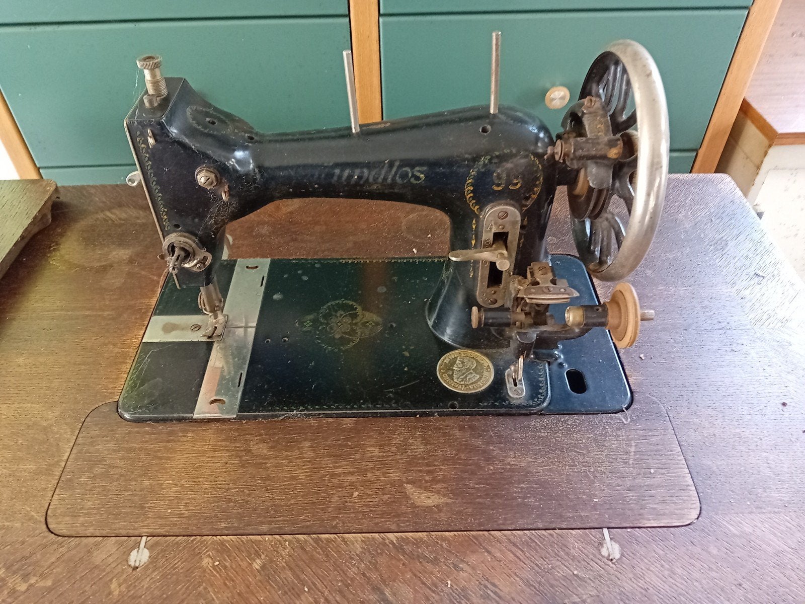 antieke naaimachine, Ophalen