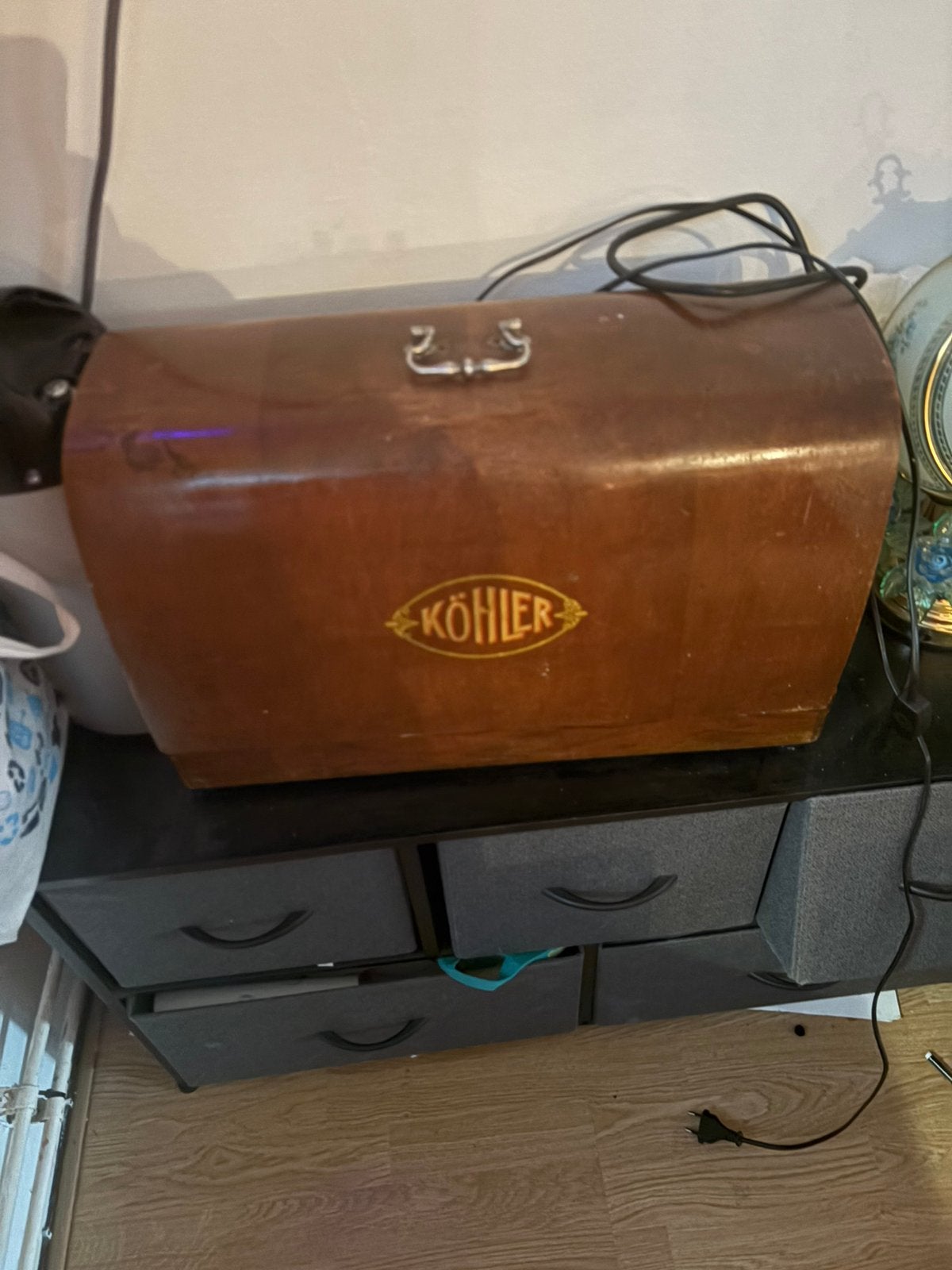 Mooie köhler naaimachine, Ophalen