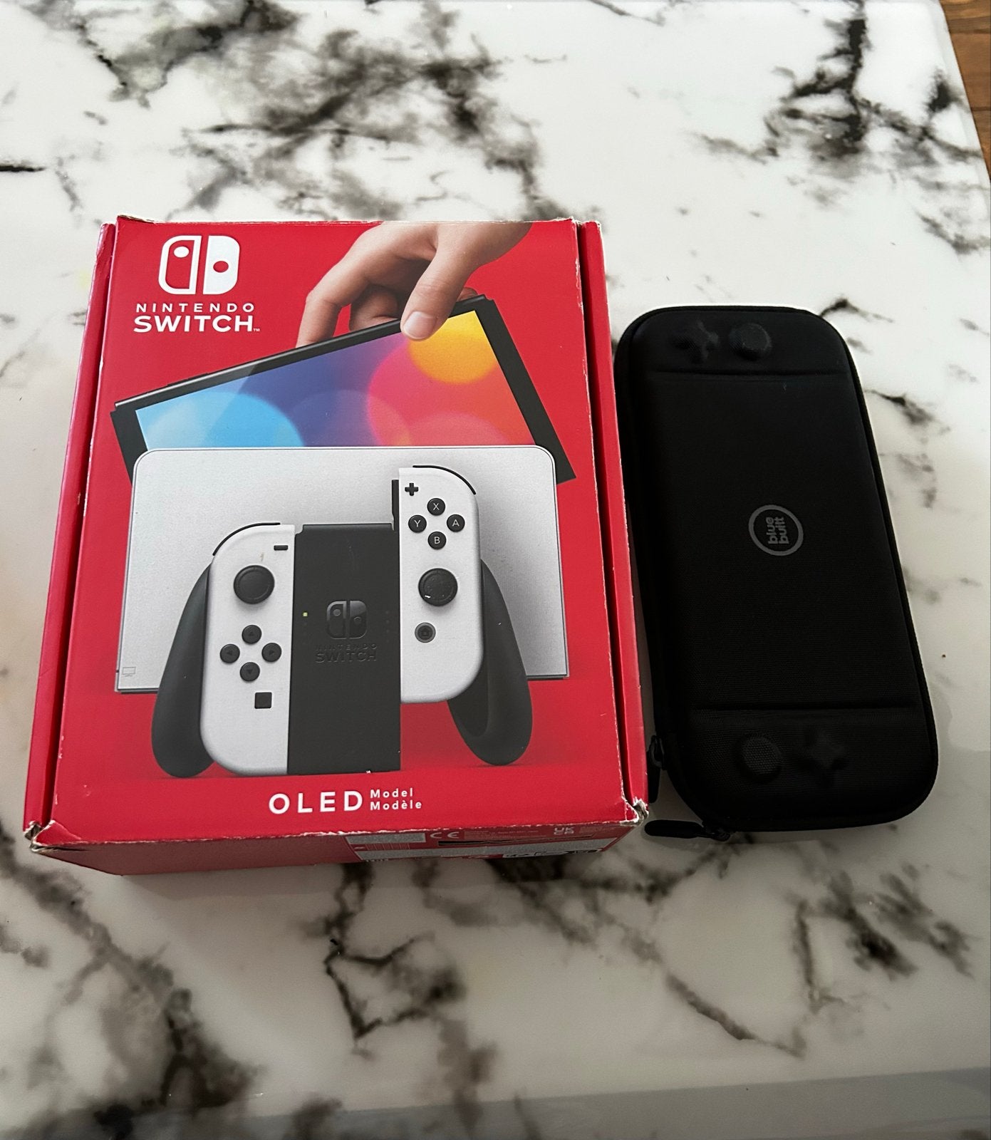 Foto 2 van Nintendo Switch OLED ZGAN + Nintendo case