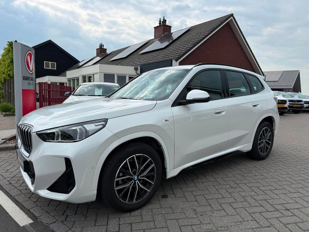 BMW X1 SDrive18i M Sportpakket Aut., 12 maanden, 136 pk, Gebruikt, Zwart