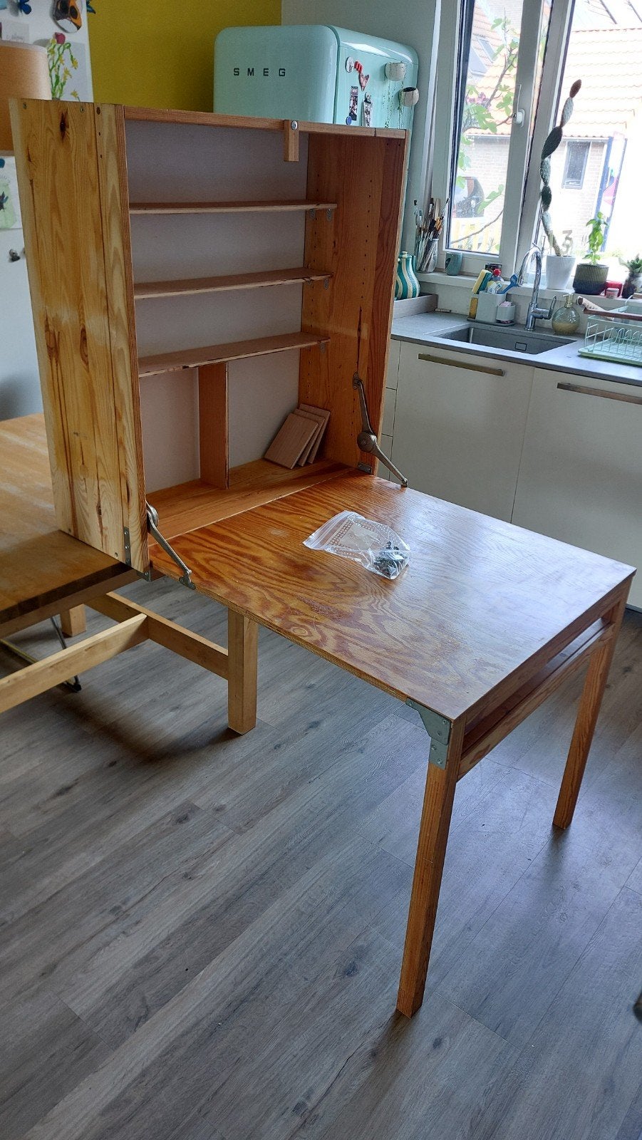 IKEA Ivar opklapbaar bureau, Ophalen