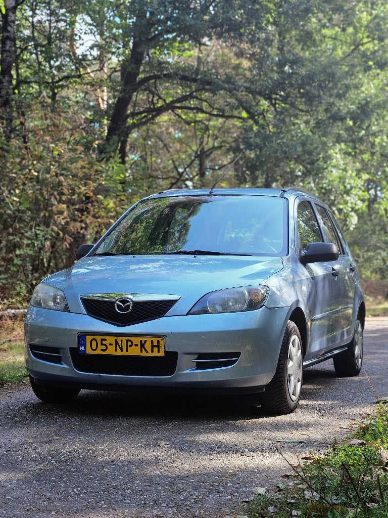 Mazda 2 1.4 Exclusive Automaat (2004) | Trekhaak | Verse APK, 40 €/maand, Zwart, 4 cilinders, Blauw