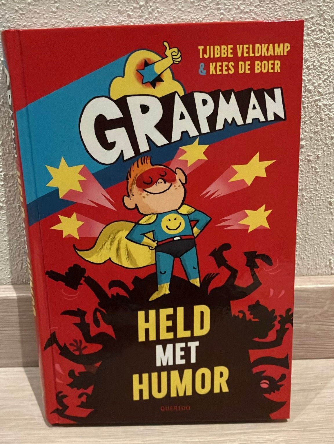 leesboek Grapman Held met humor, Boeken, Ophalen of Verzenden, Zo goed als nieuw, Verhalen