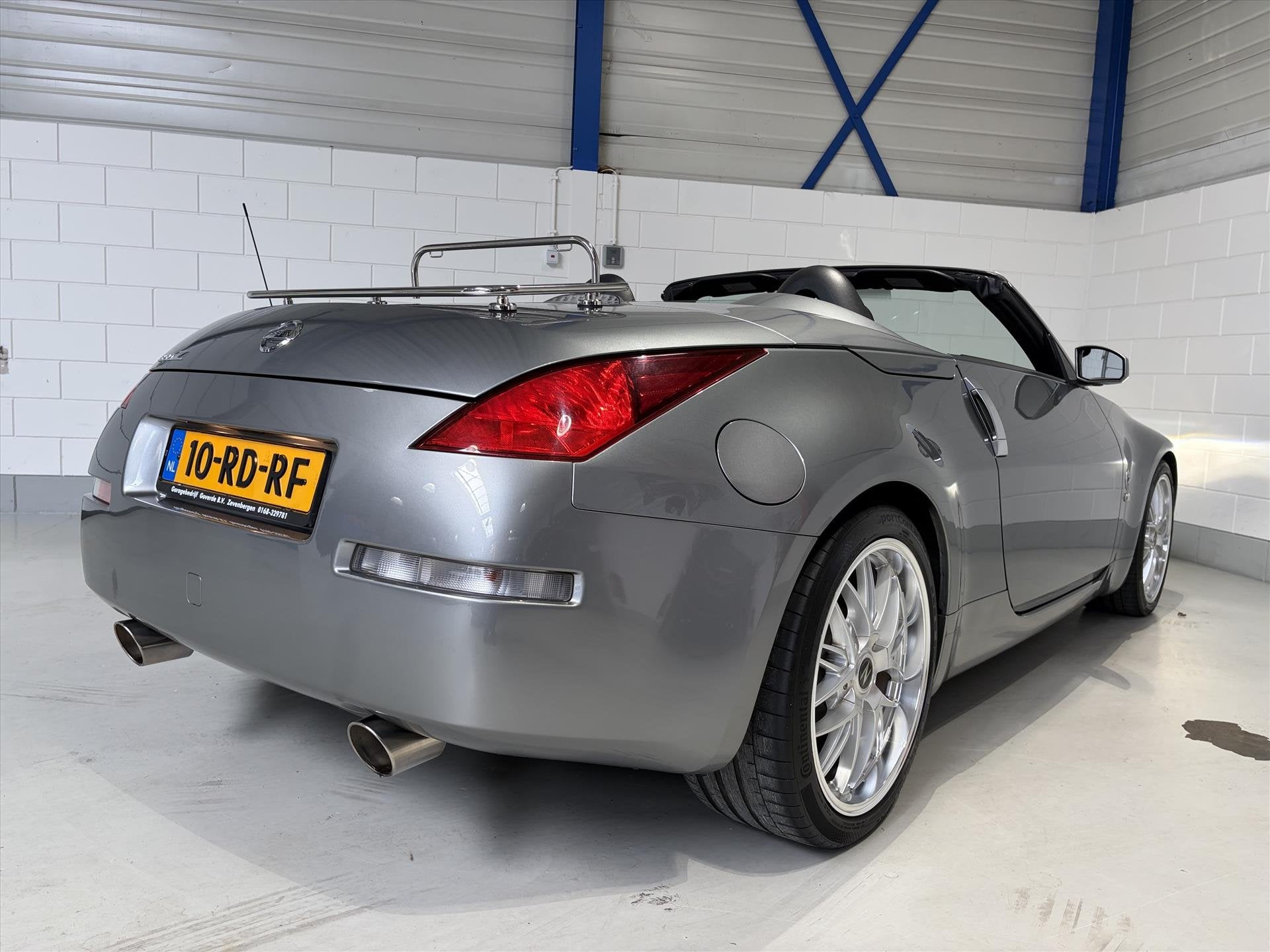 Nissan 350Z 3.5 V6 ROADSTER 280PK 73dkm NL AUTO!, Auto's, Dealer onderhouden, Zwart, Cabriolet, Bedrijf