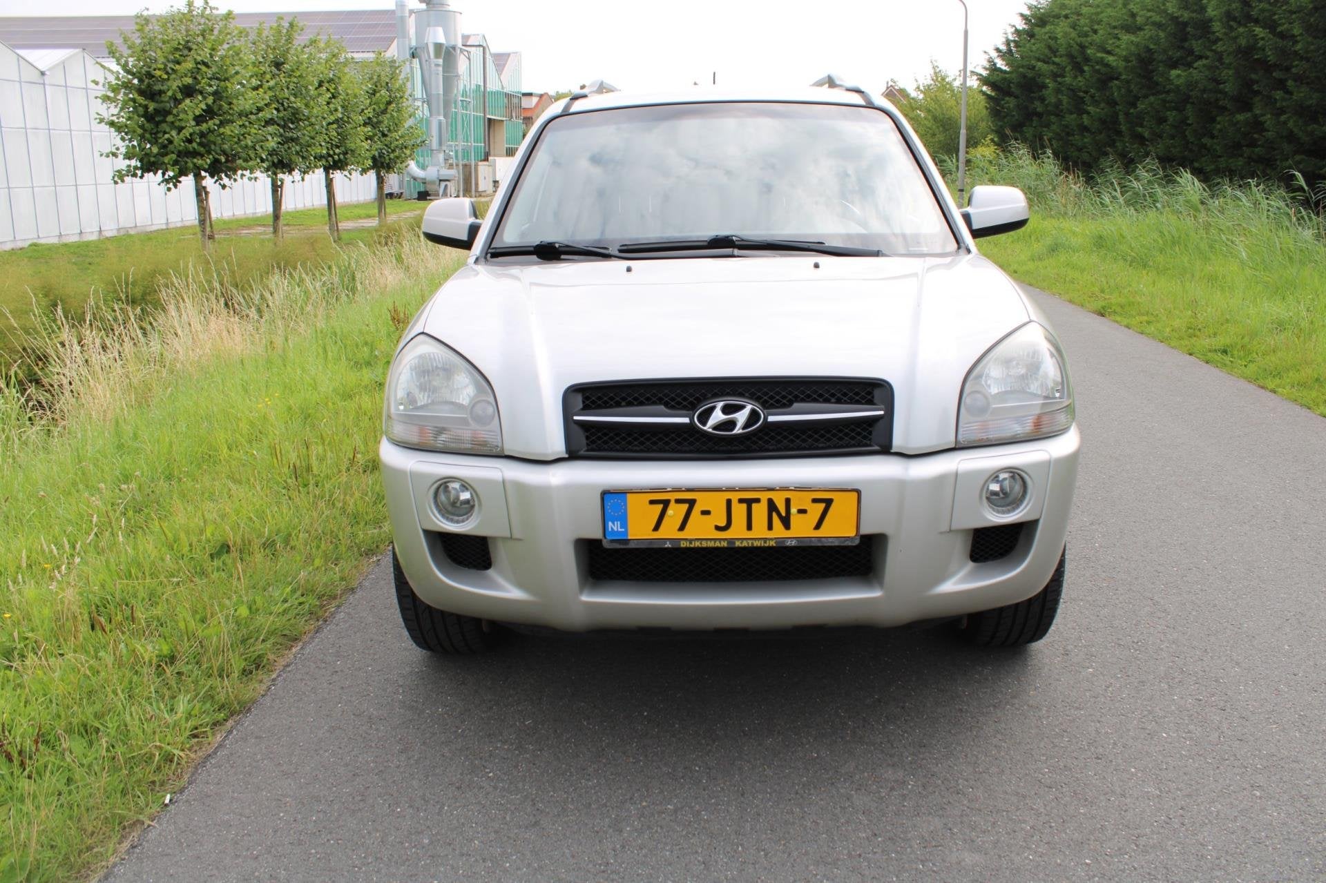 Hyundai Tucson 2.0i Style Supreme met Leder en Climate contr, Auto's, Dealer onderhouden, 4 cilinders, Handgeschakeld, Tucson