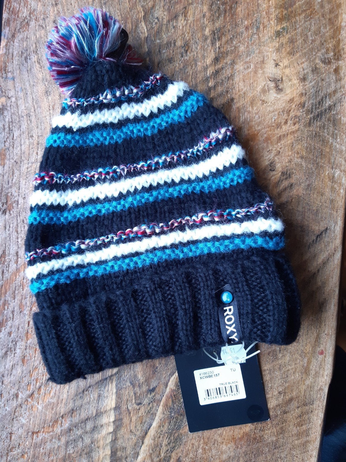 Roxy muts met pompon - Nieuw met kaartjes, Roxy, Ophalen of Verzenden, Nieuw, Muts