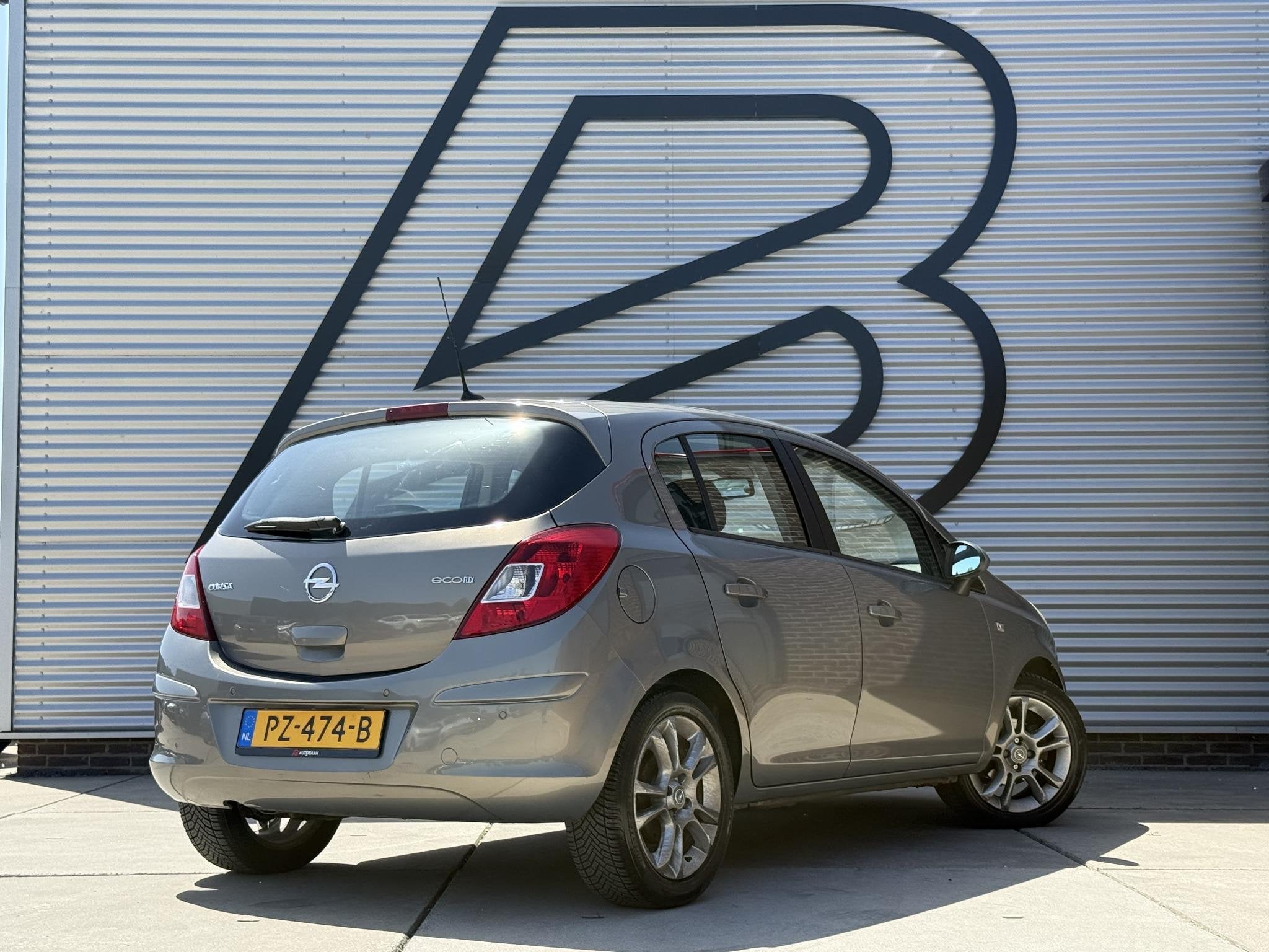 Opel Corsa 1.2-16V Cosmo Navi|Clima|Cruise|PDC|Elek ramen|Go, Auto's, Voorwielaandrijving, Euro 5, Gebruikt, 4 cilinders