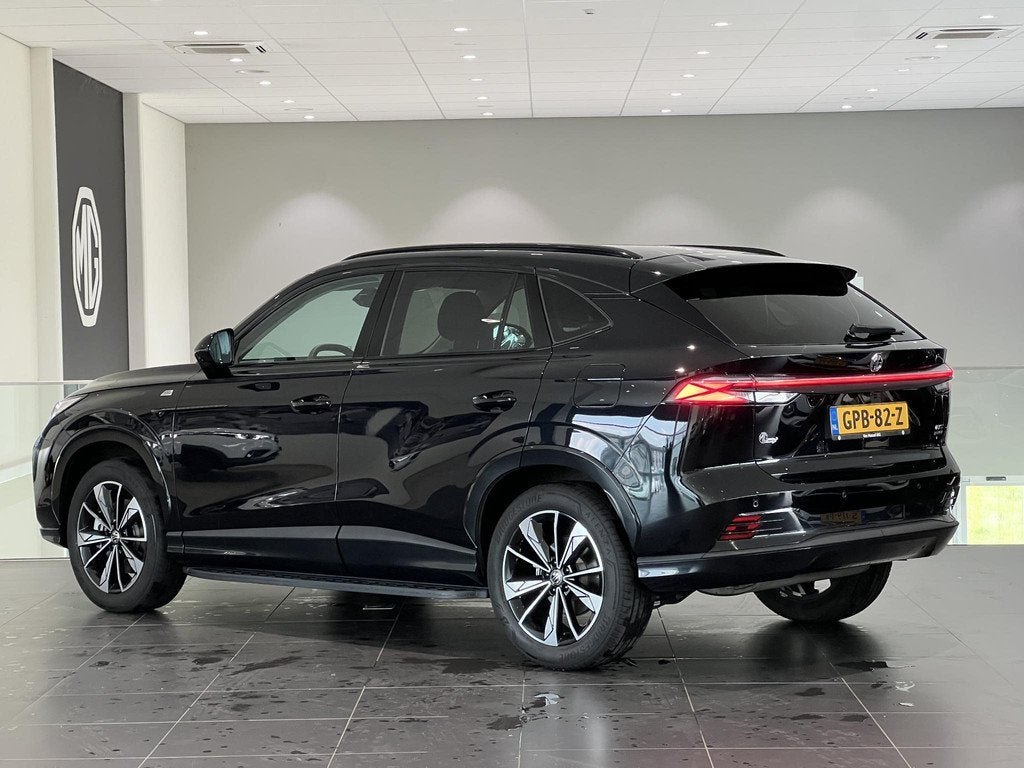 MG HS PHEV 1.5 272pk Aut. Luxury | 100km Electrisch | Navi |, Auto's, MG, 12 maanden, Stof, Automatische klimaatregeling, 4 cilinders