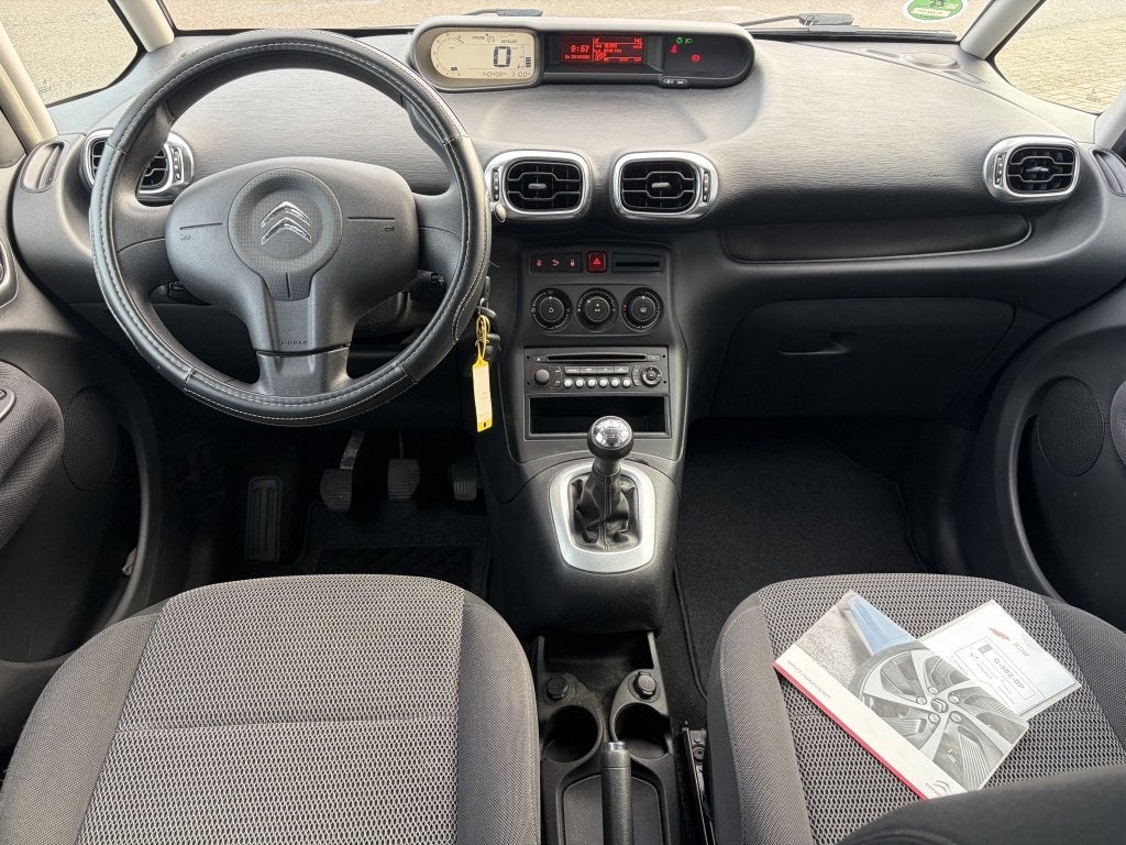 Citroen C3 Picasso VTi 120 Exclusive, Auto's, Euro 5, Stof, Gebruikt, Zwart