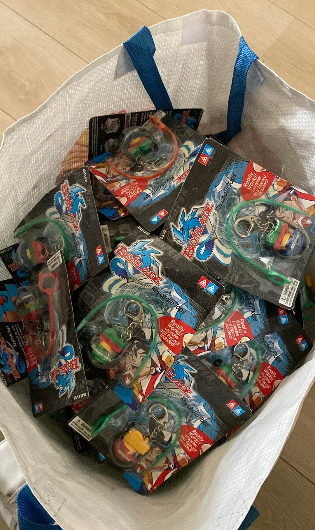 Tas vol met Beyblade sleutelhangers, Ophalen of Verzenden, Zo goed als nieuw