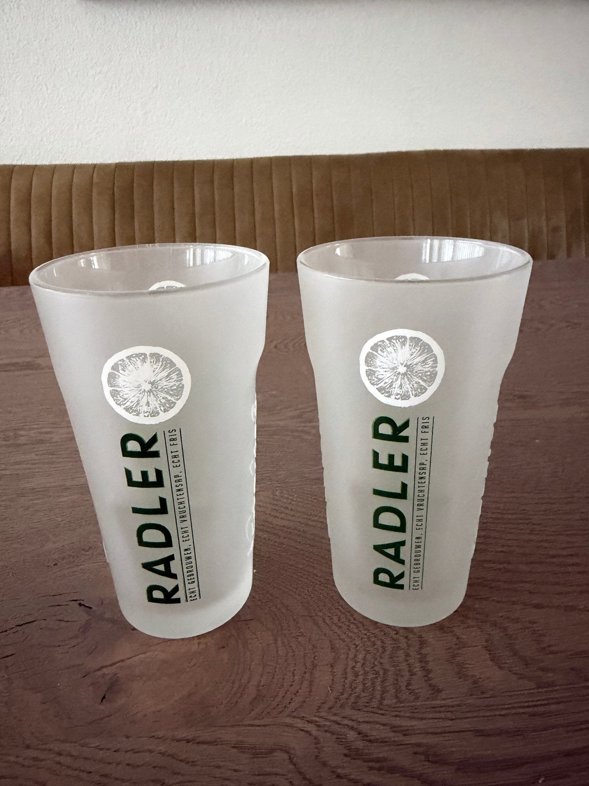 2 Grolsch Radler glazen - Zo goed als nieuw, Ophalen of Verzenden, Zo goed als nieuw, Wit, Overige merken