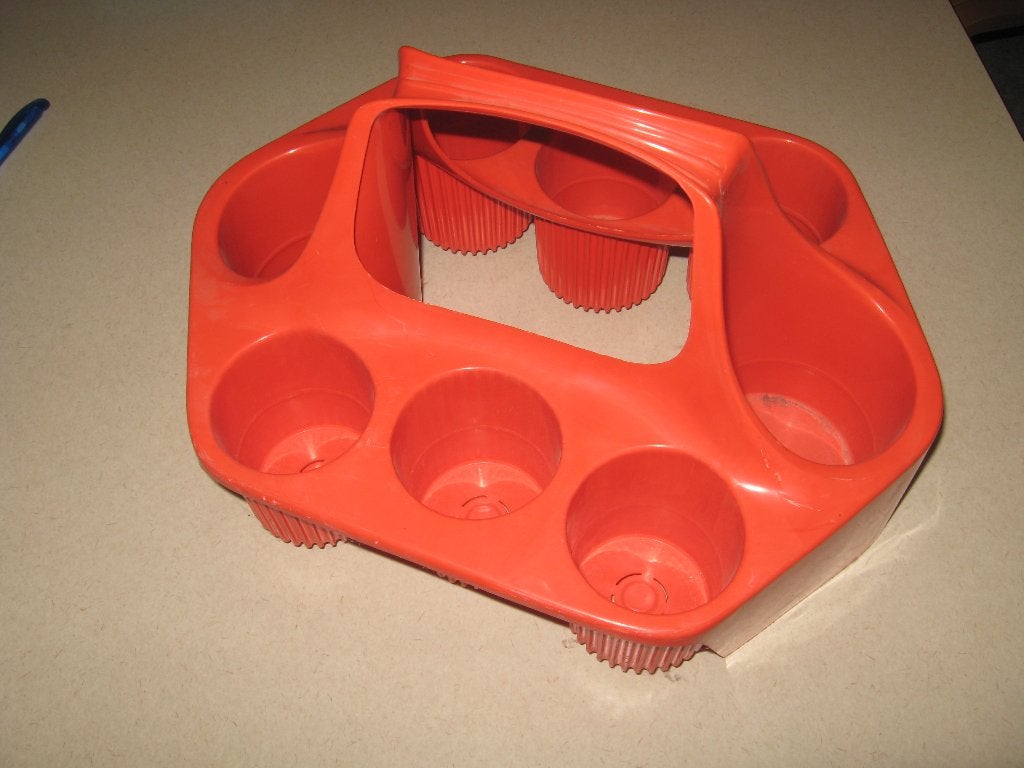 Jaren 70 seventies oranje flessendrager flessenrek wijnrek, Huis en Inrichting, Ophalen of Verzenden, Zo goed als nieuw, Kunststof